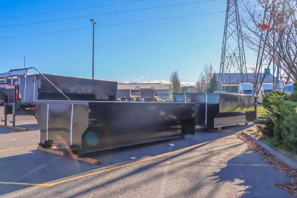 Roll-off dumpster ready for waste disposal at job site for Yard Waste Dumpster Rental in Flower Hill